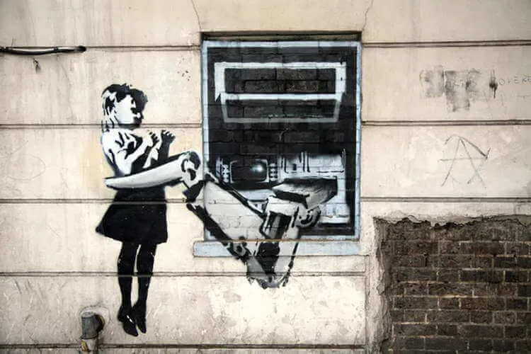 Banksy grafika dziewczynka złapana przez bankomat